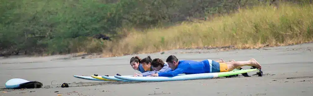 Surfing lessons to Playa Iguanita for beginners with instructor