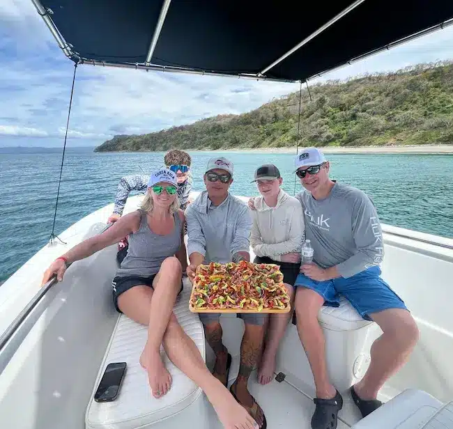 People are enjoying onboard the Sailfsh II boat